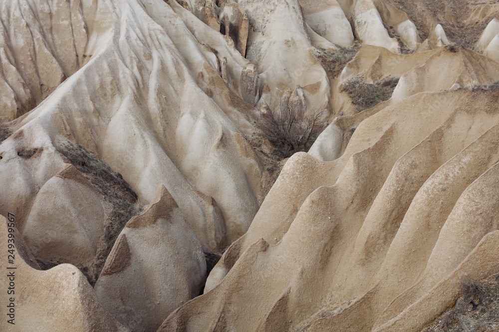 Background from Sand dunes landscape,Volcanic rock formations, Cappadocia. Background from Sand dunes landscape,Volcanic rock formations, Cappadocia.