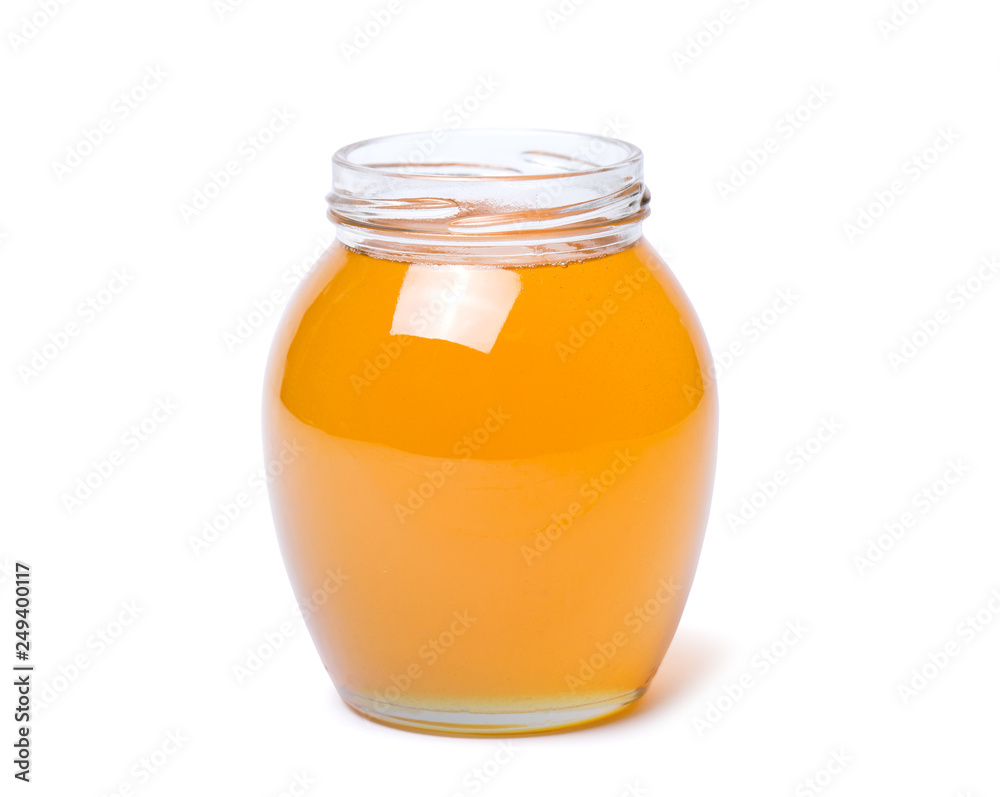honey dipper and honey in jar on white background honey dipper and honey in jar on white background