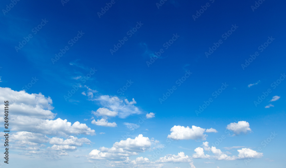 Fototapeta premium blue sky background with tiny clouds