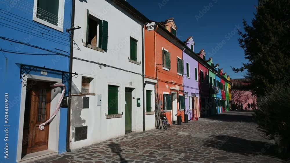 Burano, Venice - Colorful buildings between the canals of the lagoon city Burano, Venice - Colorful buildings between the canals of the lagoon city