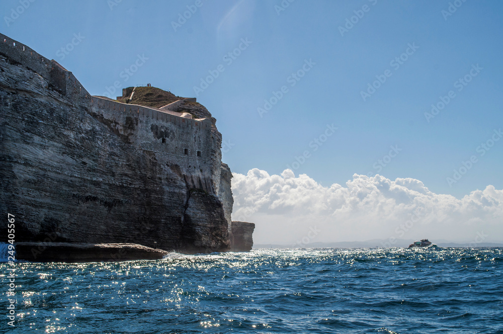 A castle on a rock overlooking the sea in Bonifacio on the island of Corsica