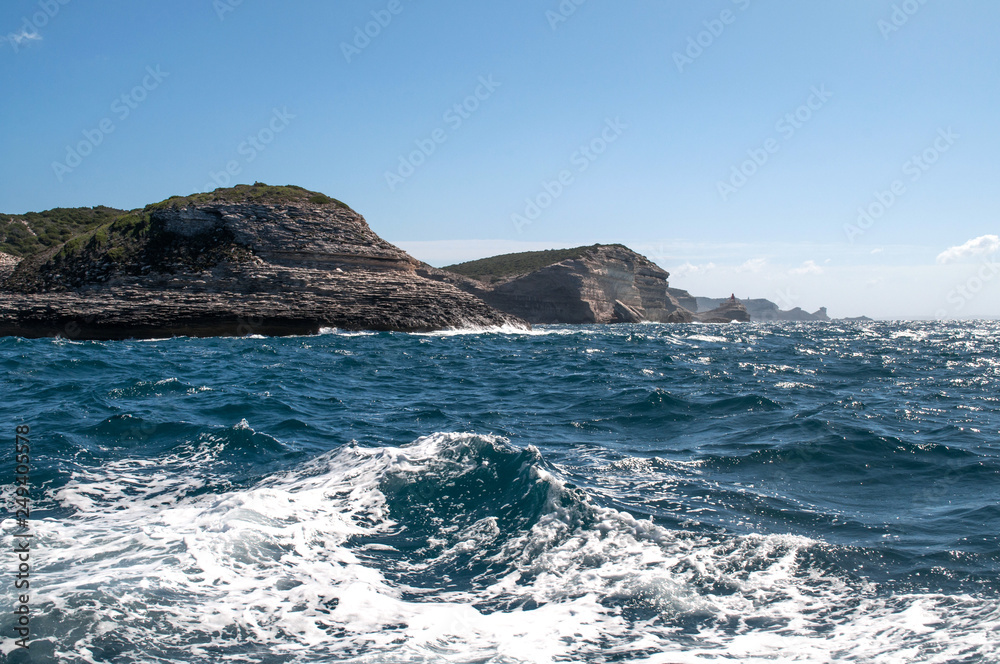 Rocky cliffs from the sea near Bonifacio in the south of the island of Corsica
