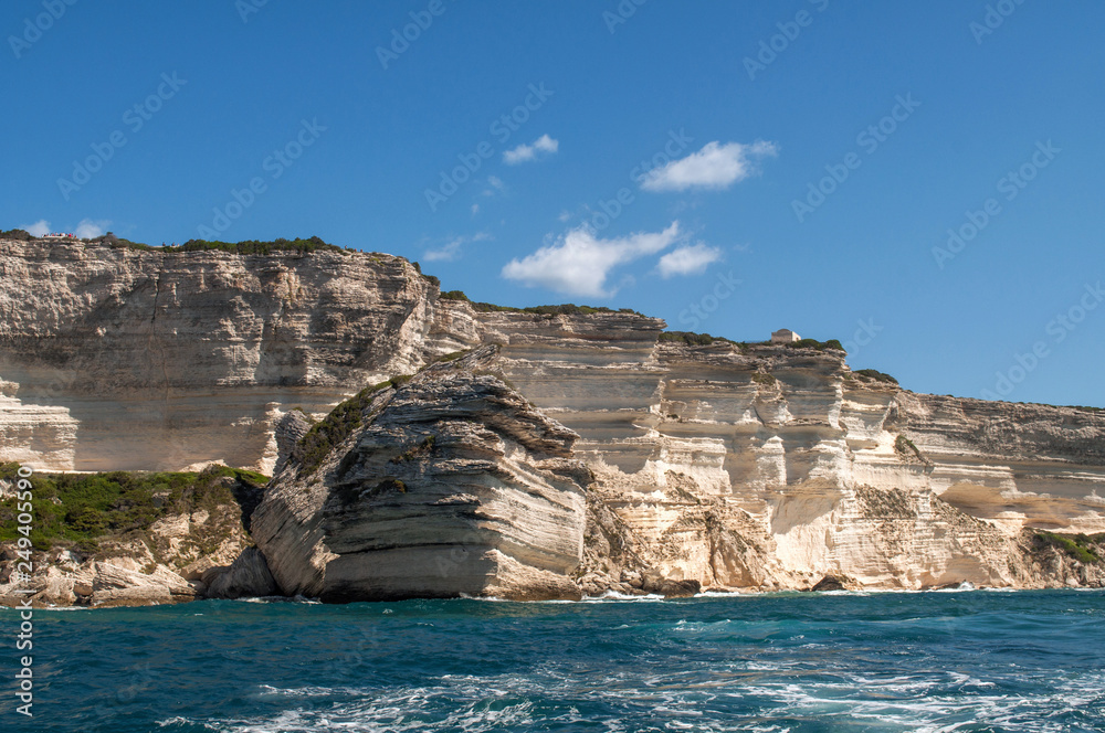 Rocky cliffs from the sea near Bonifacio in the south of the island of Corsica