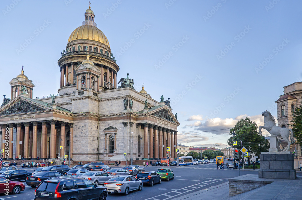  St Isaac's Square with the Saint Isaac's Cathedral and a rush hour traffic in Saint Petersburg, Russia