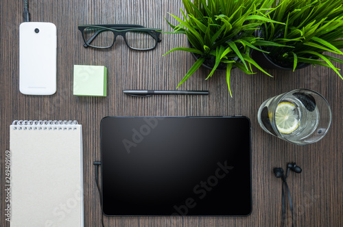 A small workplace with a tablet in a cafe.