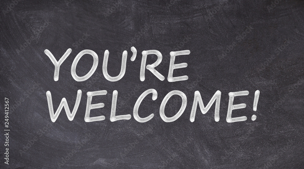 You are welcome written on blackboard You are welcome written on blackboard