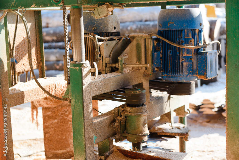 Machine for cutting wood on the boards. Sawmill. production of boards. Wood processing factory.