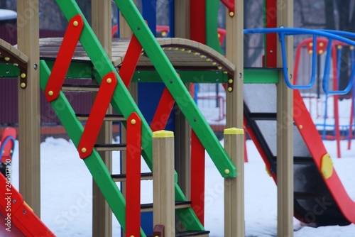 part of a color playground outside in the snow