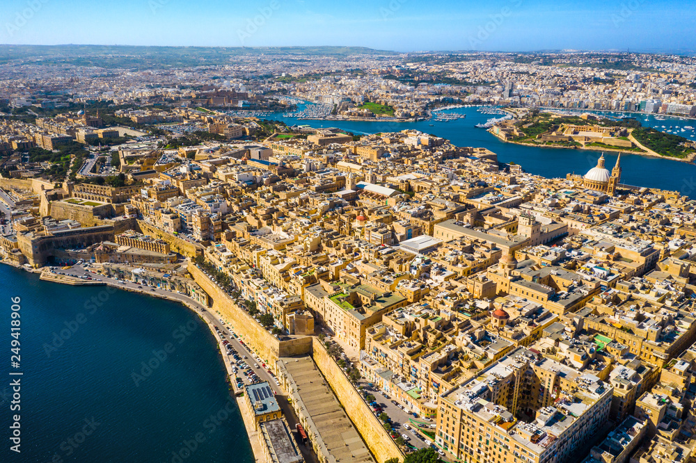 Aerial view of Valletta city - capital of Malta country, Manoel island and Sliema. Winter, Morning. Mediterranean sea.