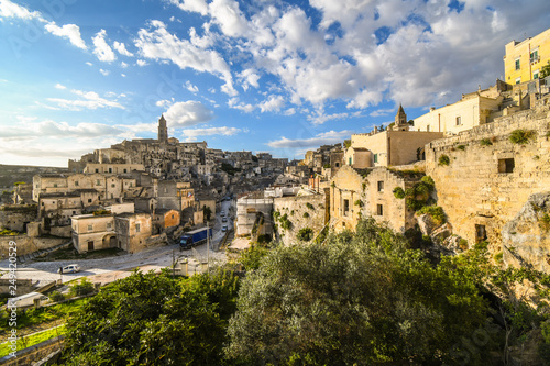 View from the convent of Saint Agostino a traffic drives down the main road through the ancient city of Matera  Italy.