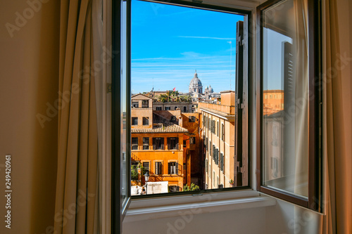 View from window of the dome of the Basilica of SS Ambrose and Charles Church on the Corso in Rome, Italy.