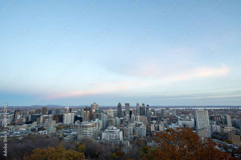 Montreal skyline, with the iconic buildings of the Downtown and the CBD business skyscrapers taken from the Mont Royal Hill. Montreal is the main city of Quebec, and the second city in Canada