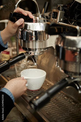 barista making coffee
