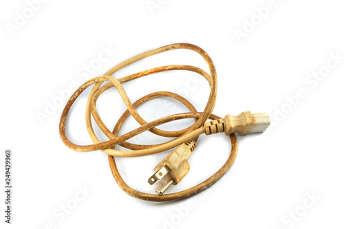 Old power plug computer electrical Power supply cable isolated on white background