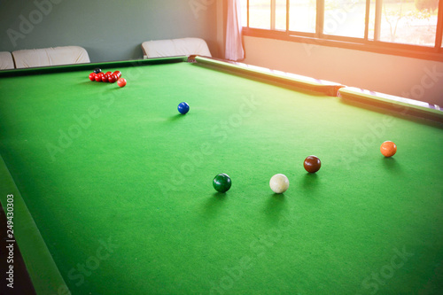 Snooker balls set on green snooker table indoor sports club / billiards game