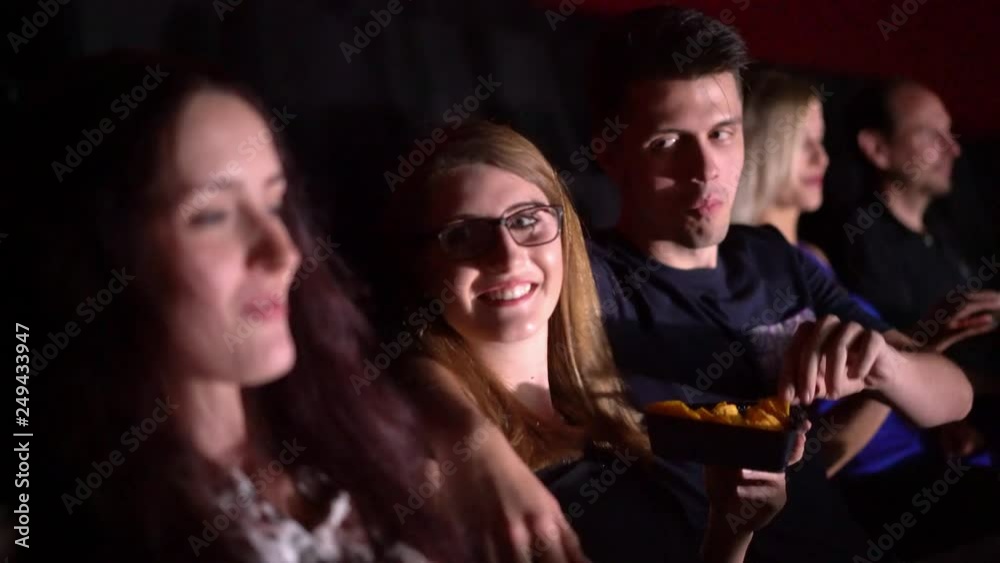 Watching a movie in a cinema - movie theater Watching a movie in a cinema - movie theater