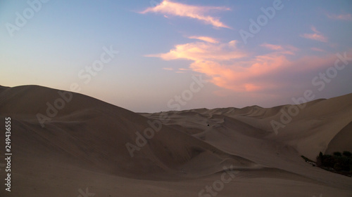 Desert during sunset at Huacachina Oasis in Ica, Peru.