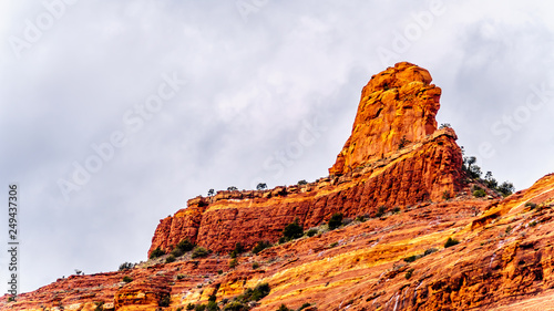 Closeup of the red sandstone peak of  Steamboat Rock at the Oak Creek Canyon near the Midgely Bridge on Arizona SR89A, just north of Sedona, Arizona, USA photo