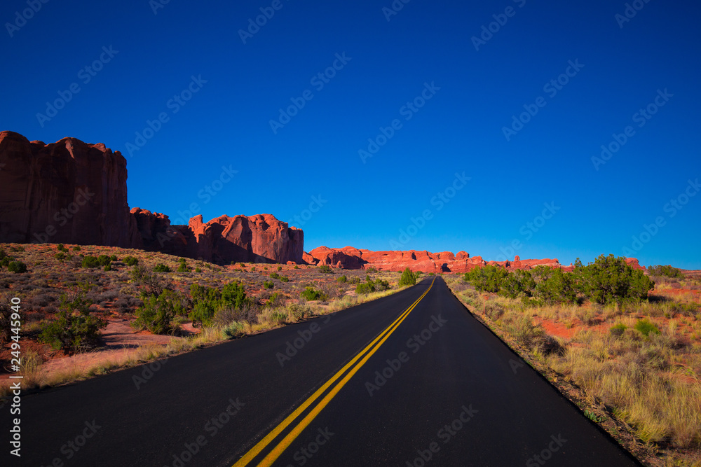 Endles road, Road through the mountains. USA. COLORADO. ARCHES NATIONAL PARK. Endles road, Road through the mountains. USA. COLORADO. ARCHES NATIONAL PARK.