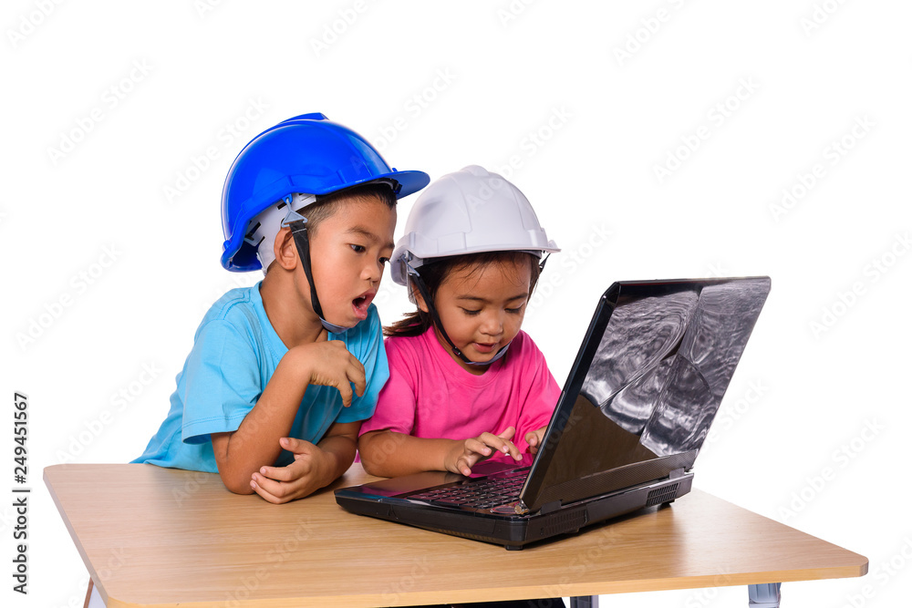 Asian children wearing safety helmet and thinking planer isolated on white background. Kids and education concept Asian children wearing safety helmet and thinking planer isolated on white background. Kids and education concept