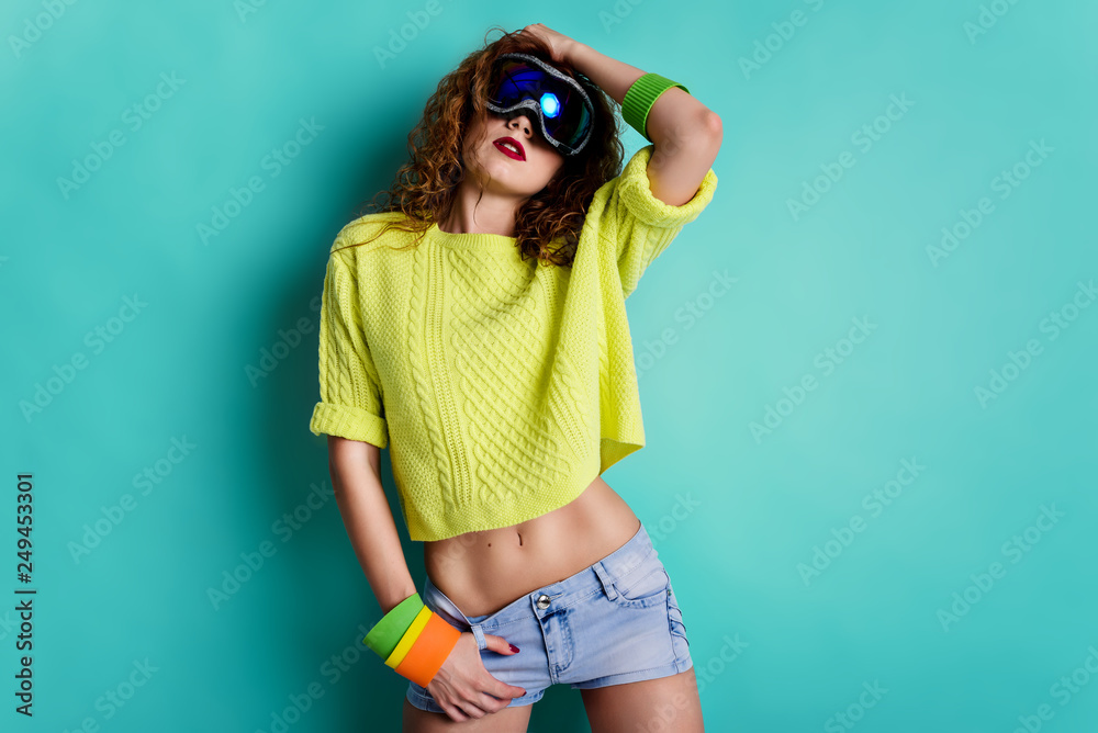 Joyful happy girl dance in ski mask and bright clothes. Minimal pop art style. Joyful happy girl dance in ski mask and bright clothes. Minimal pop art style.