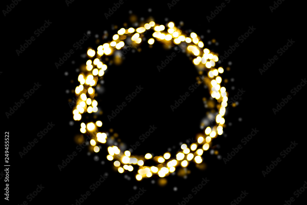Yellow and white bokeh on a black background. Can be used as a background or wallpaper. Circle shape Yellow and white bokeh on a black background. Can be used as a background or wallpaper. Circle shape