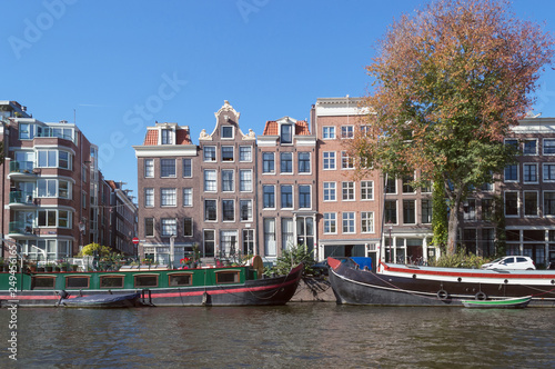 view on Amsterdam cityscape from river Amstel