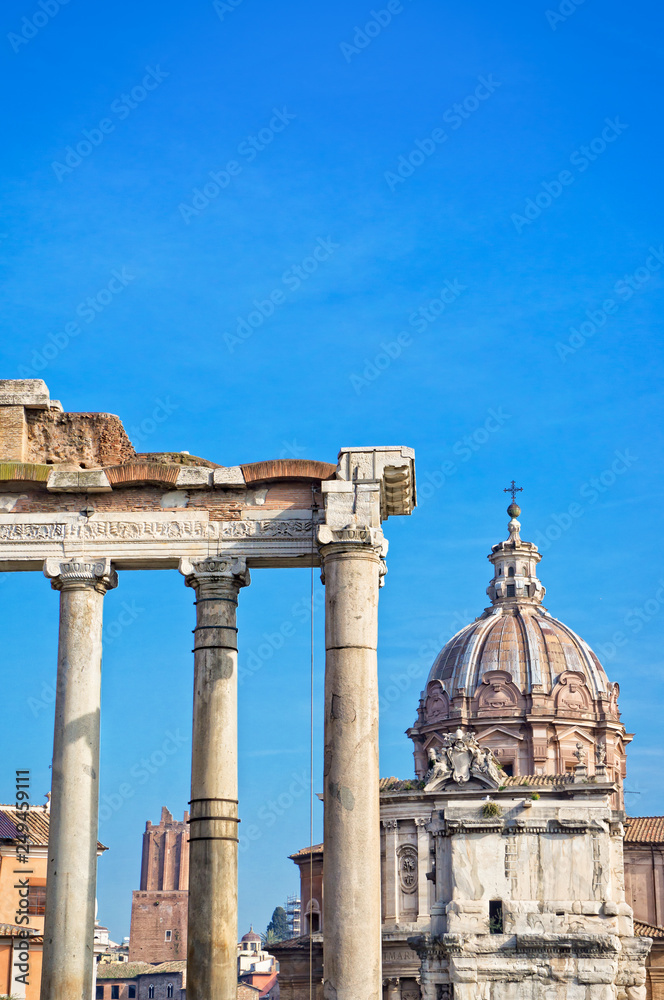 View of the Roman Forum in Rome, Italy with blue sky