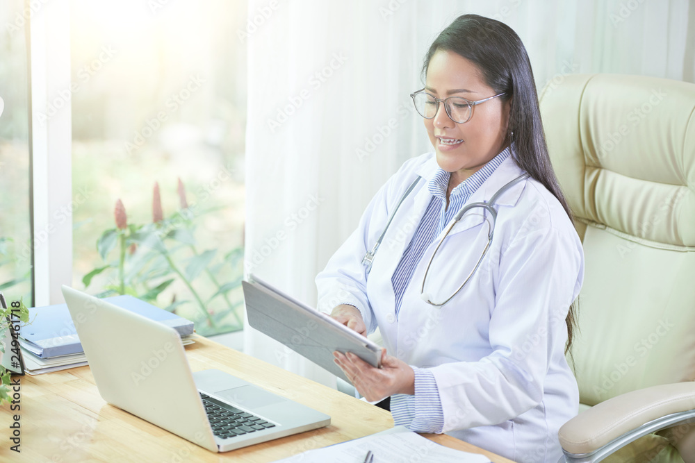 Female medical worker at work