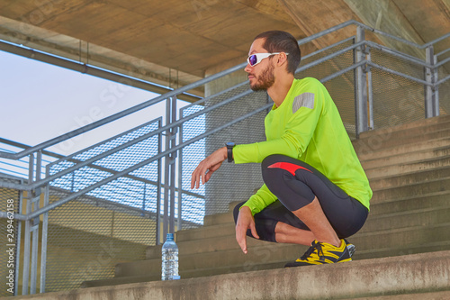 Wallpaper Mural Sportsman working out / jogging on a big city urban bridge. Torontodigital.ca