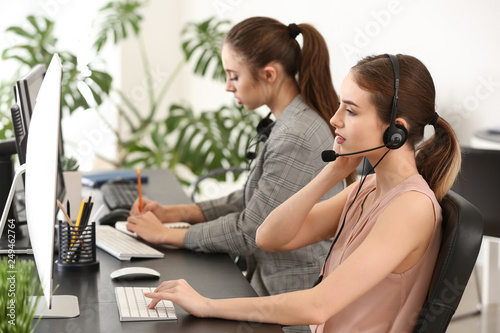 Technical support agents working in office