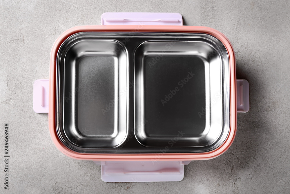 Empty school lunch box on grey background