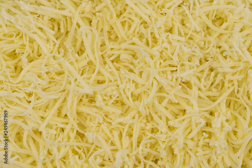 Grated cheese texture background