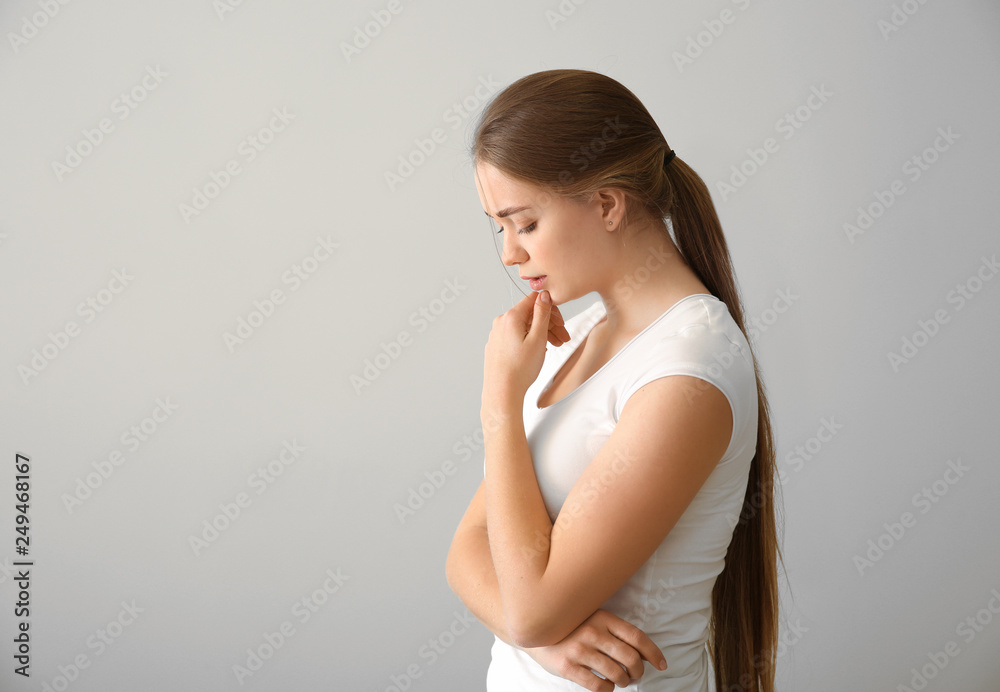 Fototapeta premium Pensive Young Woman Profile