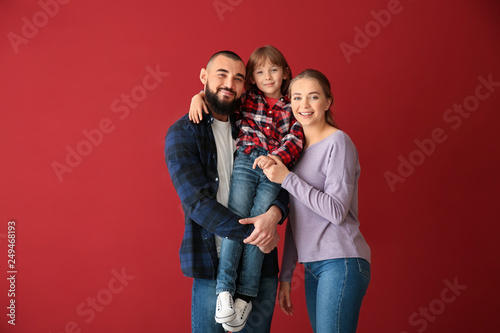 Happy family on color backg...