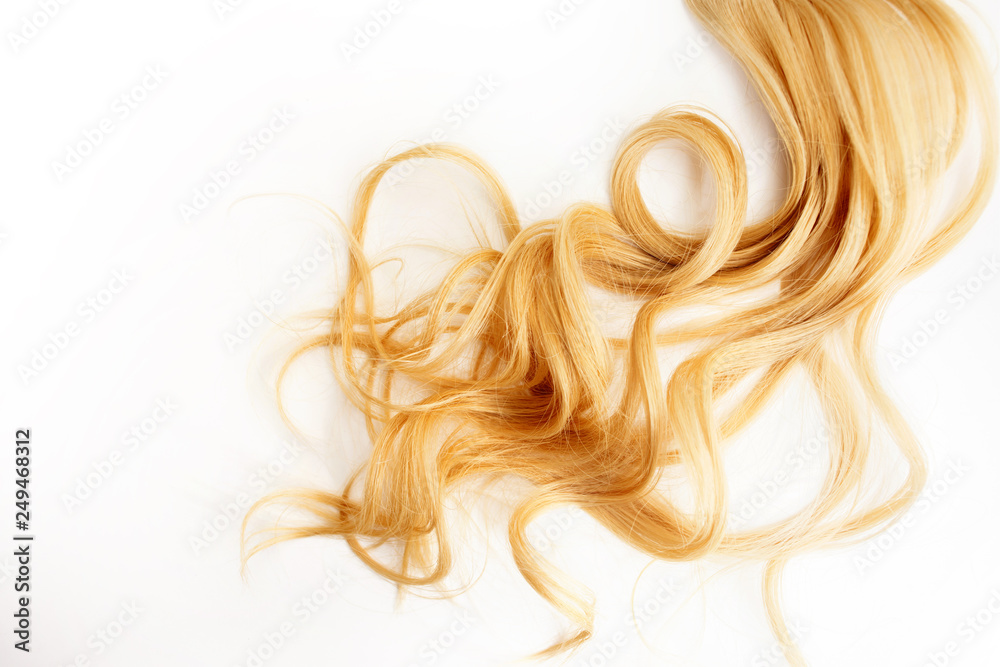 Golden Curls hair isolated on white background. strand of Blonde or red hair,  hair care Stock Photo | Adobe Stock