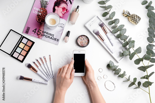 Beauty blogger with mobile ...