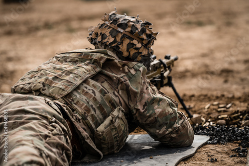 Machine Gun Action | An American Soldier firing a machine gun during the German Schützenschnur.