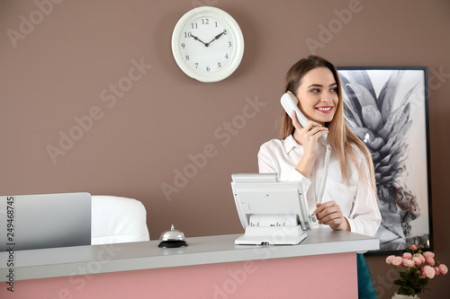 Female receptionist talking...