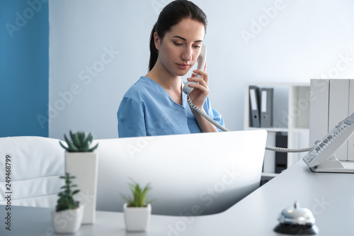 Female receptionist talking...