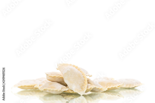 Dumplings raw with stuffing on a white background