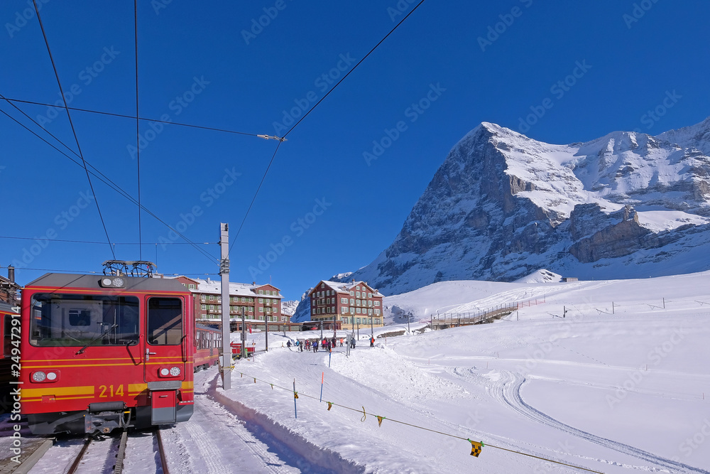 Jungfrau railway train station at Kleine Scheidegg to Jungfraujoch, north face of mount Eiger in background, Switzerland Jungfrau railway train station at Kleine Scheidegg to Jungfraujoch, north face of mount Eiger in background, Switzerland
