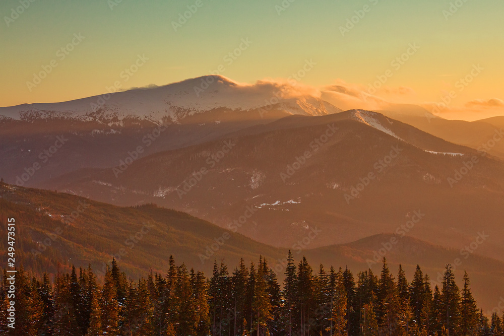 Obraz premium Carpathian mountains at dawn, beautiful outdoor winter background
