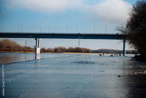 Not completely frozen river in winter. Half the river is frozen © bo.kvk