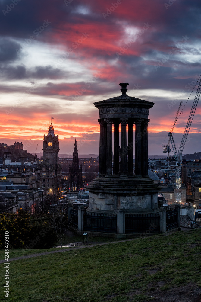 view from Carlton Hill over Edinburgh with Dugald Stewart Monument at sunset