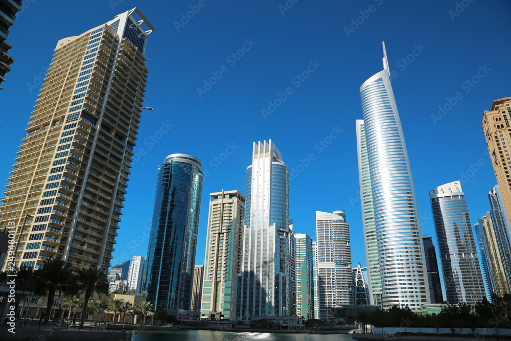 Almas tower and Jumeirah Lakes Towers, Dubai Multi Commodities Centre, UAE Almas tower and Jumeirah Lakes Towers, Dubai Multi Commodities Centre, UAE
