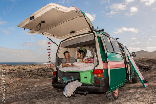 Couple in trunk of caravan