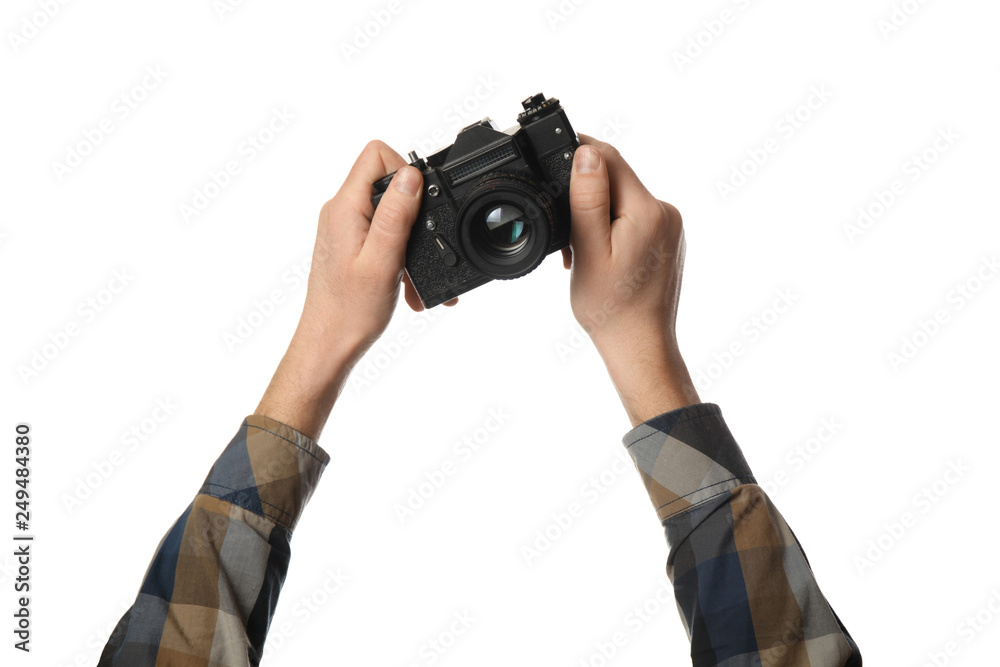 Vintage camera in hand isolated on white background. Photography and memories. - obrazy, fototapety, plakaty 