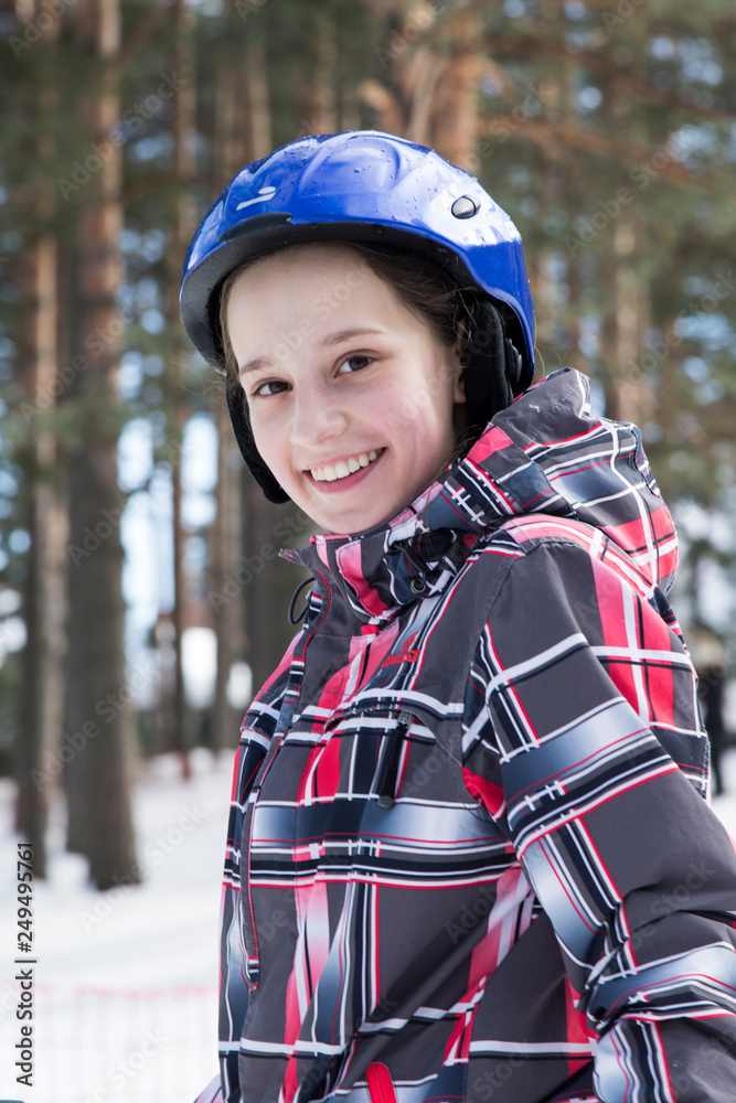 Beautiful and smiling girl skiing Beautiful and smiling girl skiing