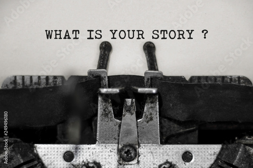 Fotografie What is your story word with black and white typewriter concept